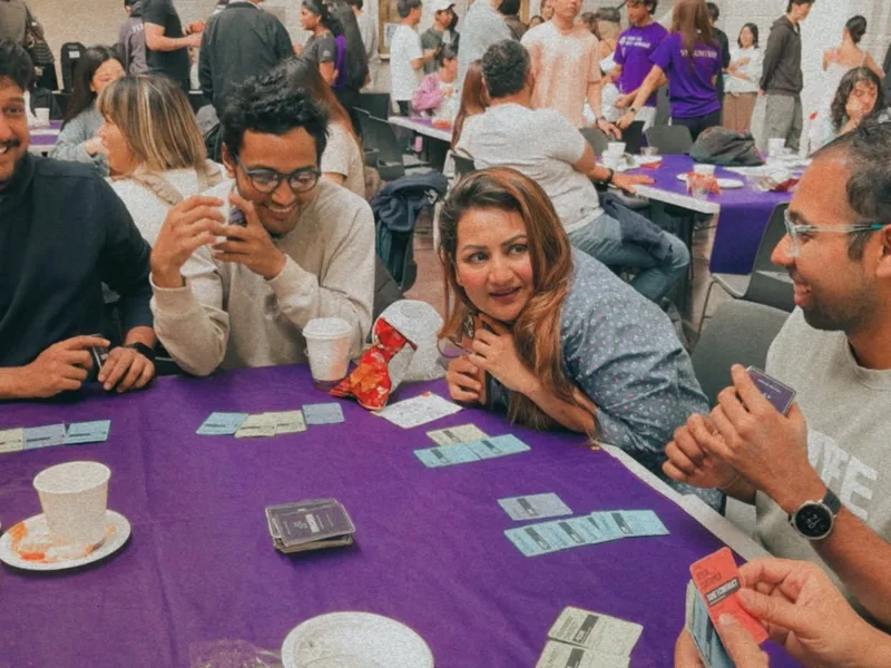 A player considering their hand during a UNICORN playtest